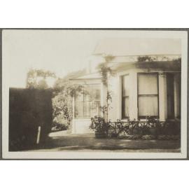 Side of house with large windows