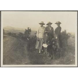 Four unidentified women and one child