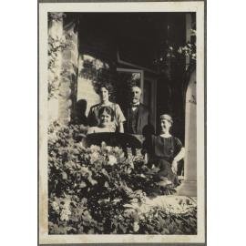 Willi Fels and three unidentified women on porch