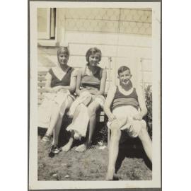 Two unidentified women and one unidentified man