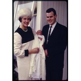 Elizabeth and John Kingsley Walsh with their son Andrew on his christening day