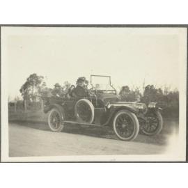 Five unidentified people in a car