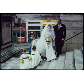 Jennifer Walsh on the day of her wedding, with her sister Elizabeth, father John, and flower girls
