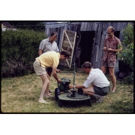 Men with Hayter lawnmower