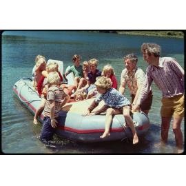 'Barry and Les pushing off boat'
