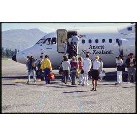 Passengers boarding Ansett New Zealand aircraft [at Queenstown]