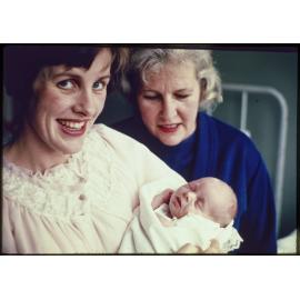 Elizabeth Hanan and her mother Lady Enid Walsh with baby Alison, aged 9 days