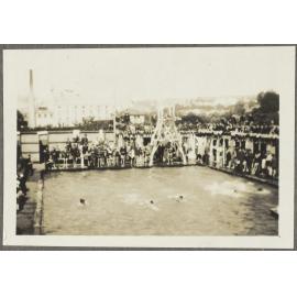 Swimming race with onlookers