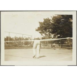 Man on tennis court