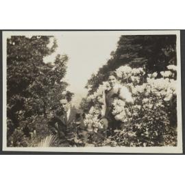 Charles and Lesley Brasch among shrubs