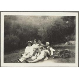 Henry and Lesley Brasch, Jane McCartney and two unidentified women sitting on grass