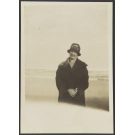 Unidentified man standing on beach