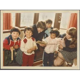 Otago Girls' High School pupils with children at the Childcare Centre, Cargill Street