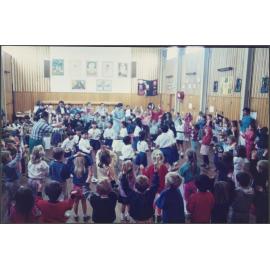 Cambodian children performing a circle dance at Brockville School