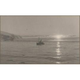 Whale-catcher at sunset