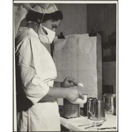 Nurse preparing baby food