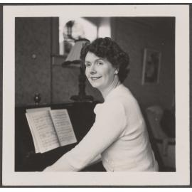 Brenda Shore sitting at a piano