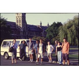 Aquinas College group with van