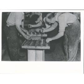 Preserving Works. Canning whitebait, soldering lids