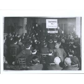 New York fur dealers viewing moving pictures of New Zealand