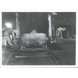 McSkimming - Son's concrete pipe works at Kensington, Dunedin Showing re-inforced concrete being manufactured. - original captio
