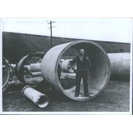 McSkimming - Son's concrete pipe works at Kensington, Dunedin Showing re-inforced concrete pipe 6 feet diameter- original captio