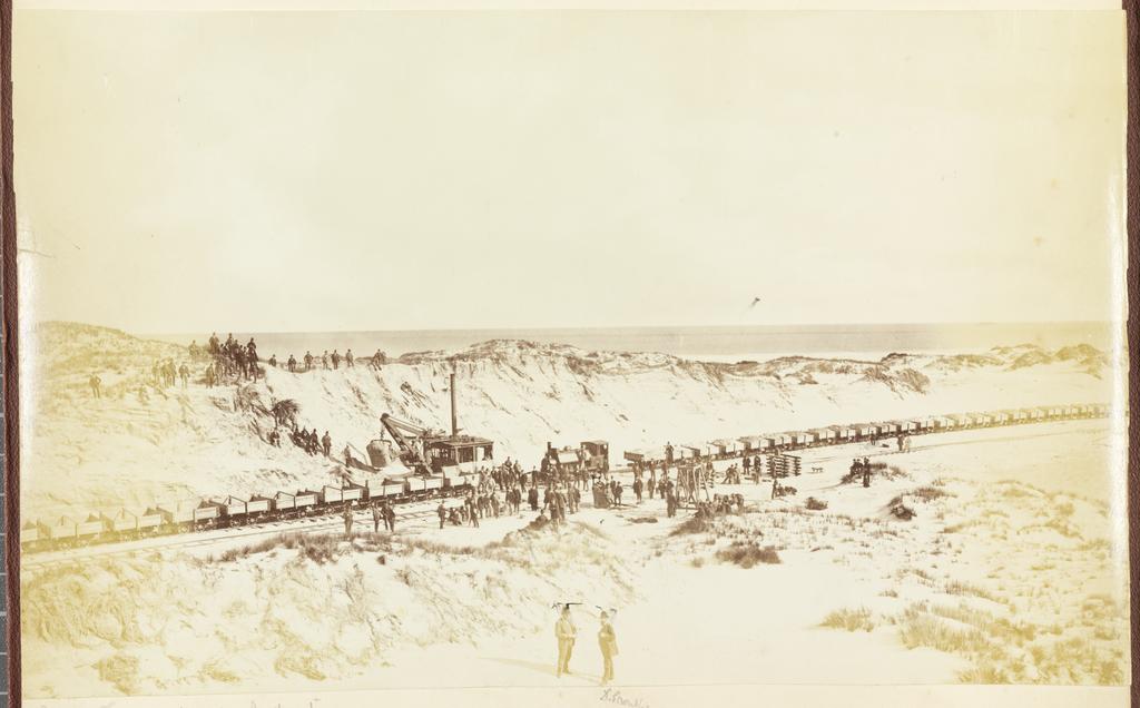 Loading sand for Dunedin reclamation