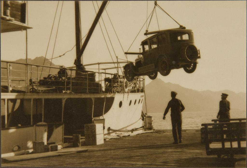 Car being hoisted onto or off a ship