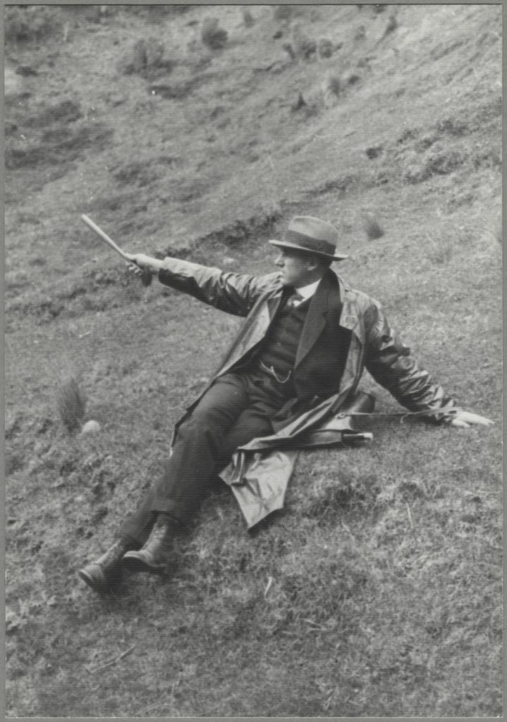 W.N. Benson engaged in field work